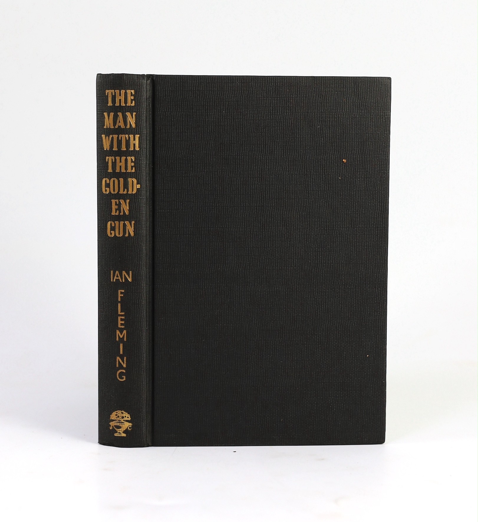 Fleming, Ian - The Man with the Golden Gun. First Edition. half title, publisher's black cloth, gilt-lettered on spine, in coloured pictorial d/wrapper, with the white and green patterned e/ps. Jonathan Cape, 1965
